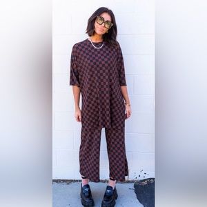 Dressed in Lala never worn brown and black check playsuit